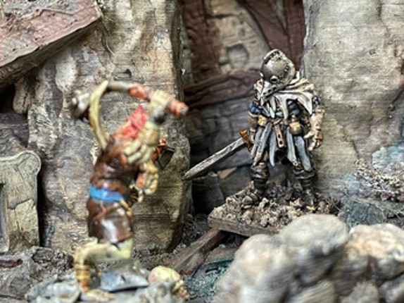 Engraved miniature with a long sword. Image