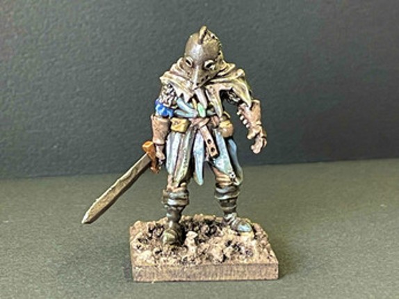 Engraved miniature with a long sword. Image