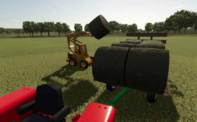 New Holland L555 and John Deere 675/B Image